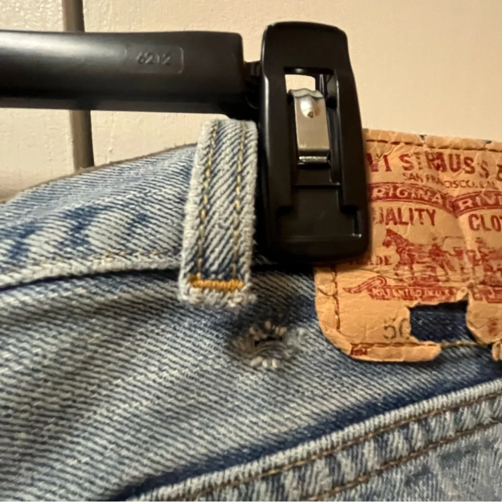 Levi's 505 Regular Fit Blue Straight Jeans with Distressed Details.38x32